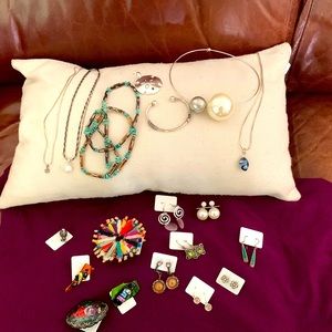 A treasure trove of loose jewelry, including silver, Chico’s, European pieces